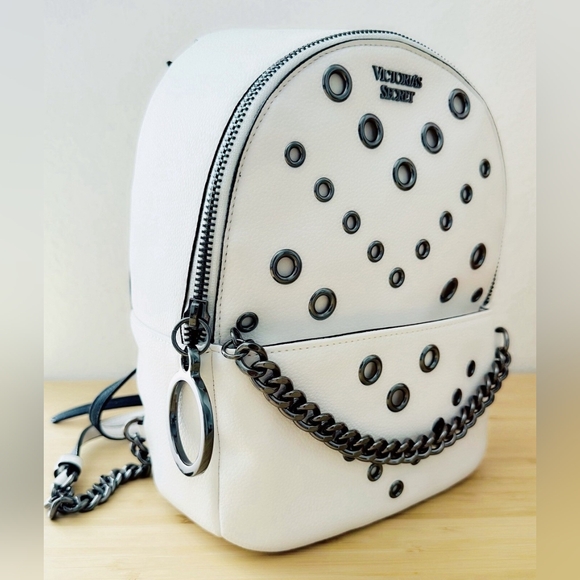 Victoria's Secret Handbags - Victoria's Secret Grommet City White Purse Backpack with Chain Detail